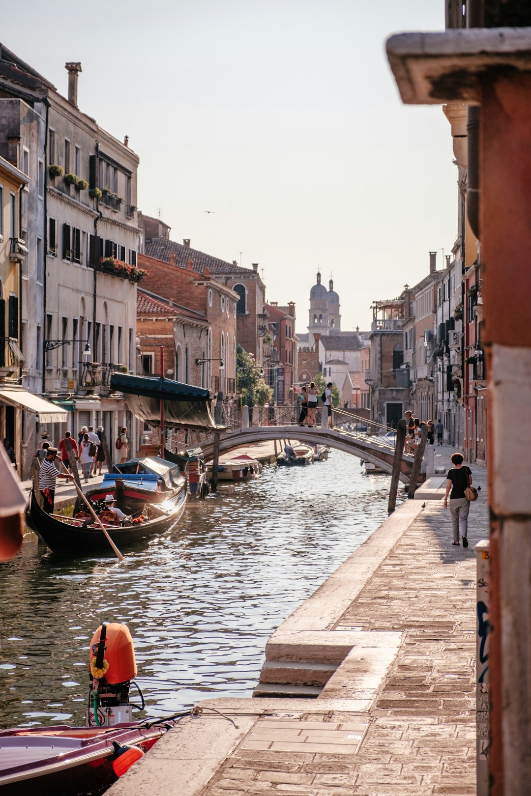 boat on river beside houses