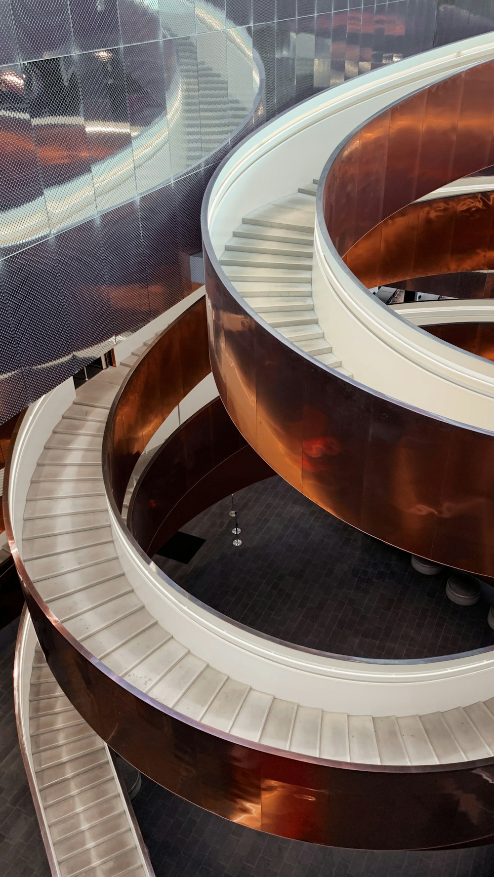 a large circular staircase in a building