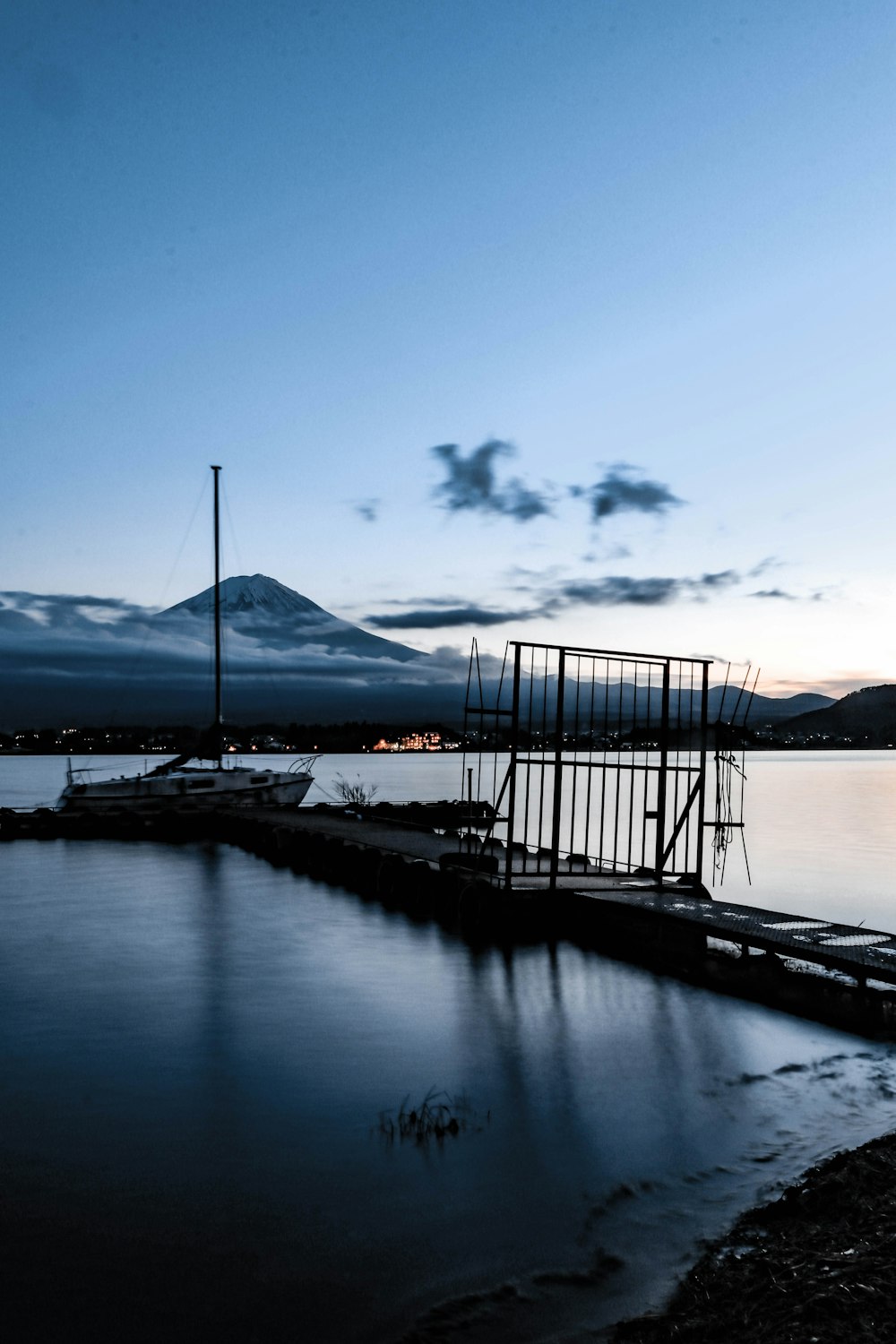 a body of water with a boat in the distance