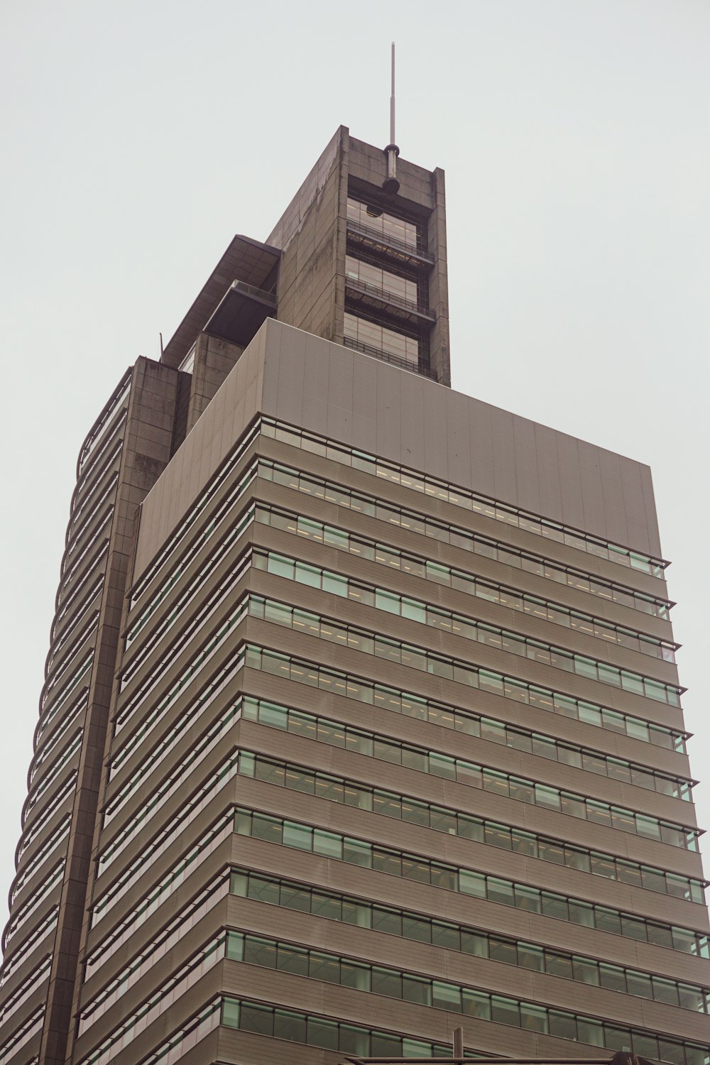 brown concrete high-rise building