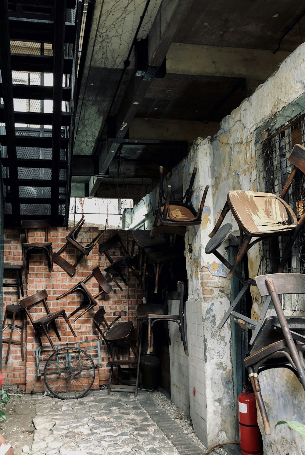 wooden chairs on walls photo