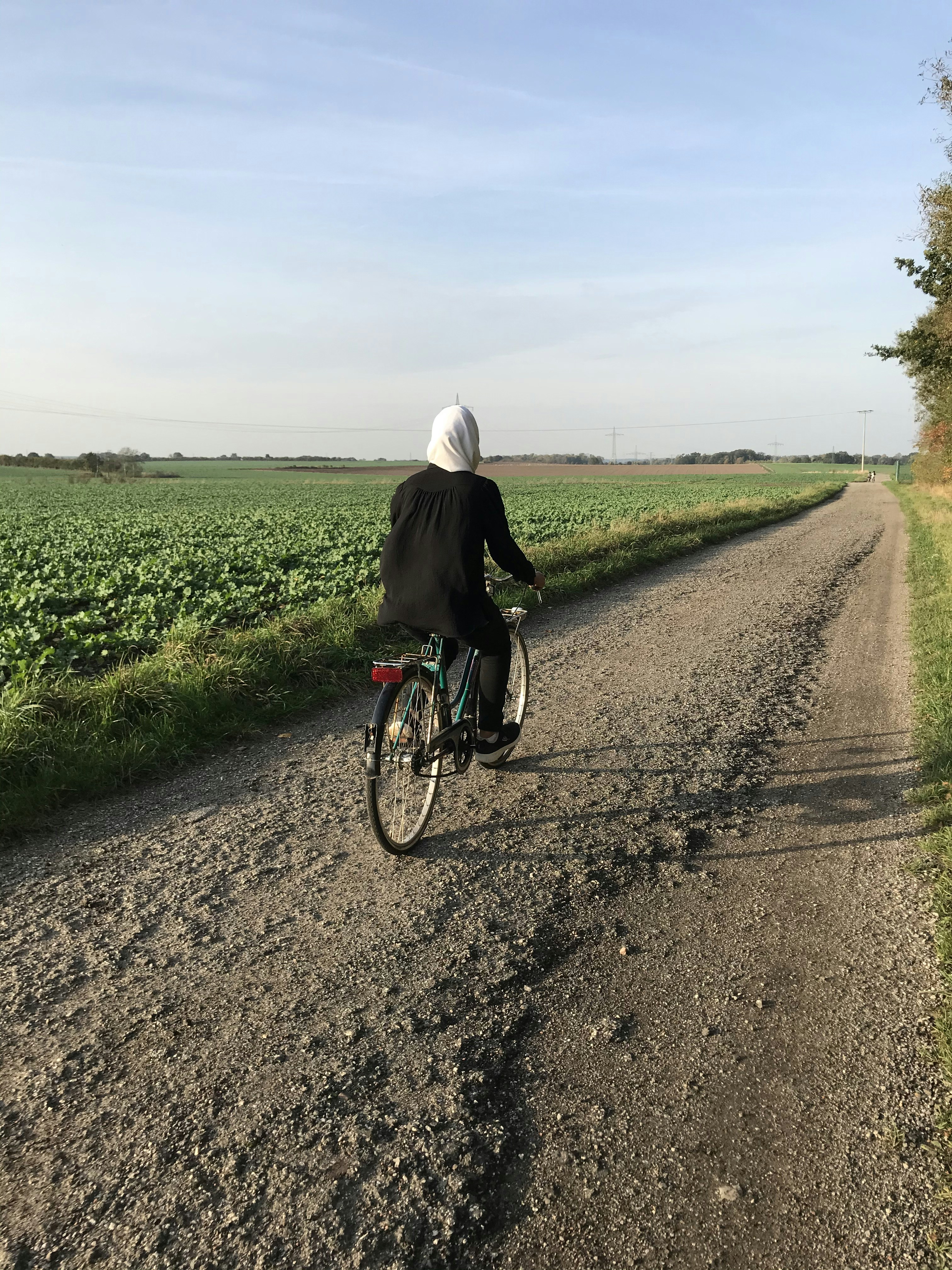 unknown person driving bicycle