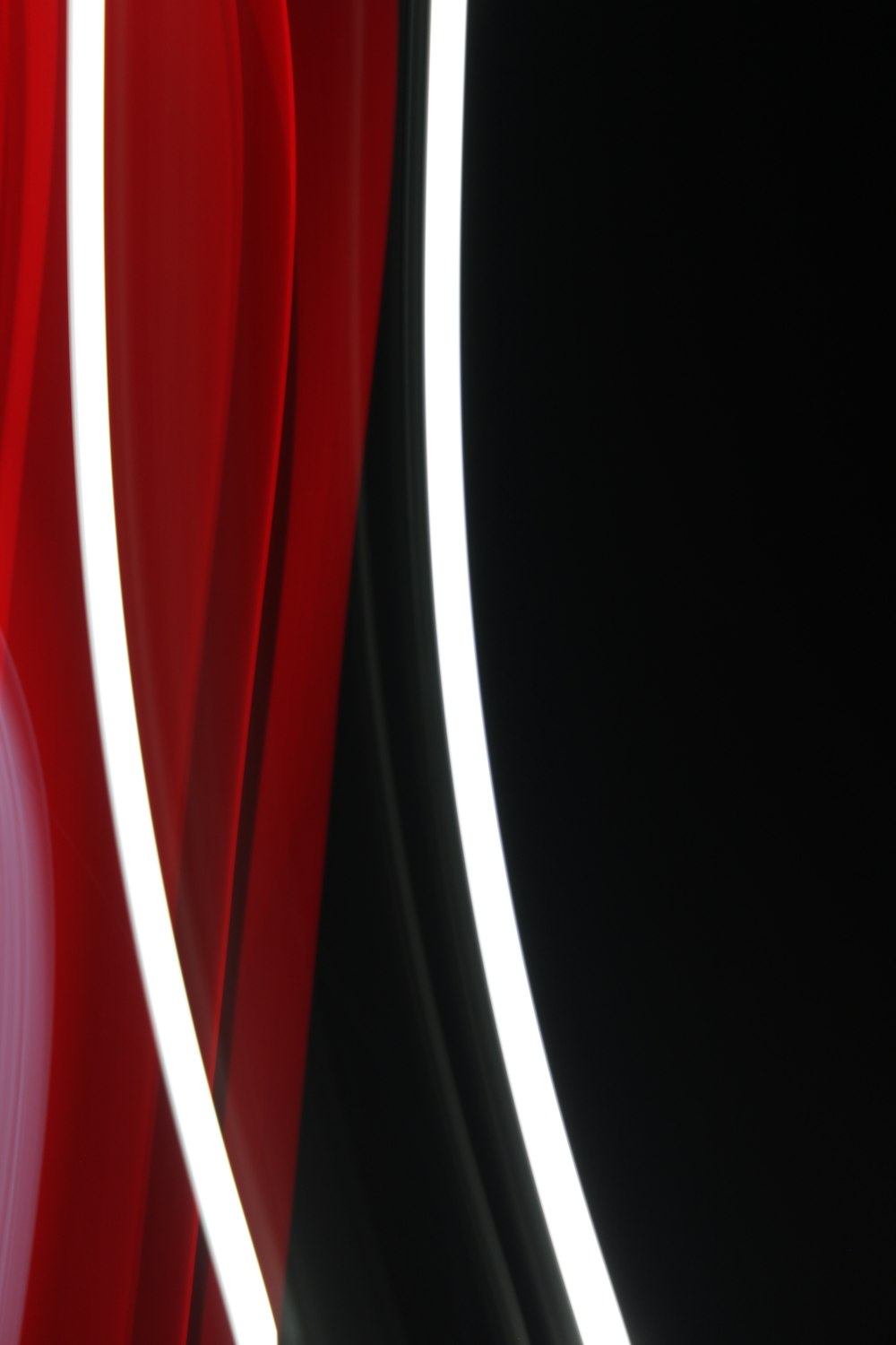 a close up of a red and black wall
