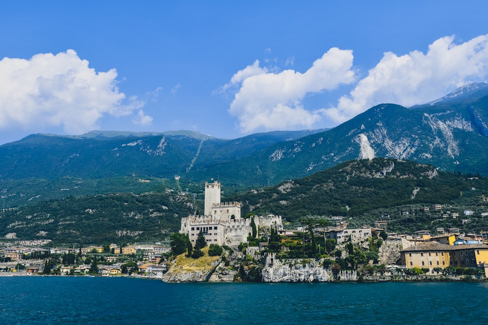 photography of mountain near ocean during daytime