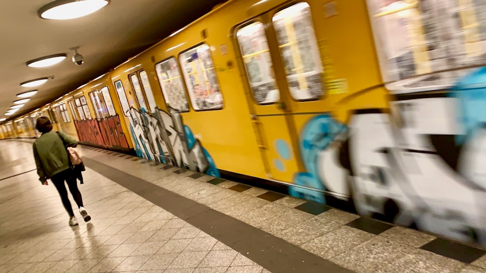 person standing in the train station