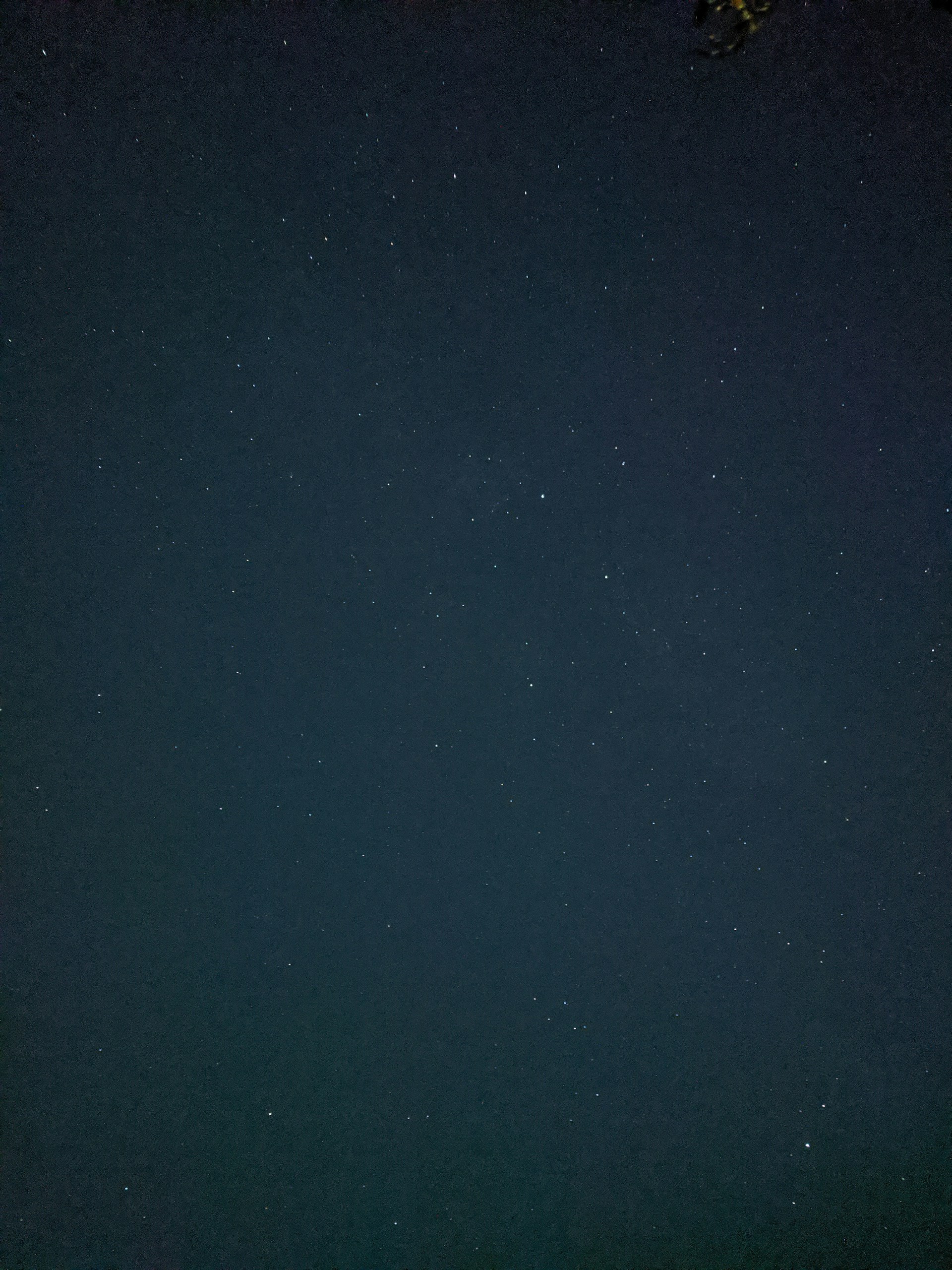 woman wearing yellow long-sleeved dress under white clouds and blue sky during daytime