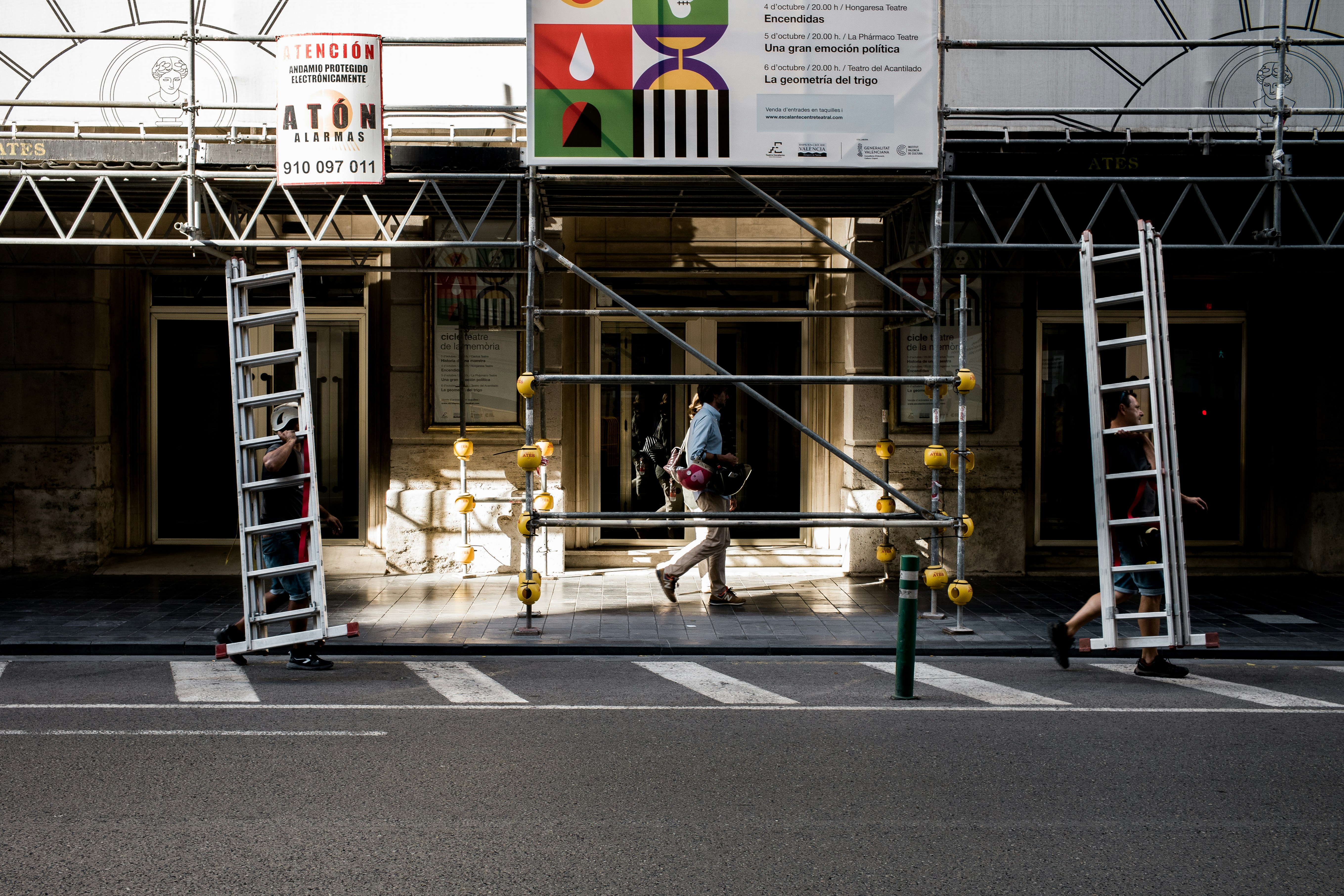 urban food delivery robot navigating busy city streets with pedestrians and traffic