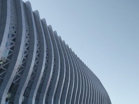low-angle photography of gray concrete building