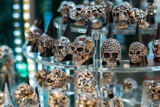 A set of punk-inspired 3D printed vendor displays with skull and rose motifs.