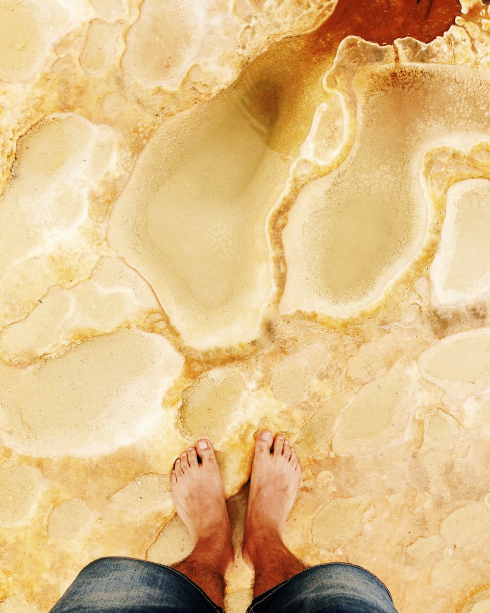 person standing on sand