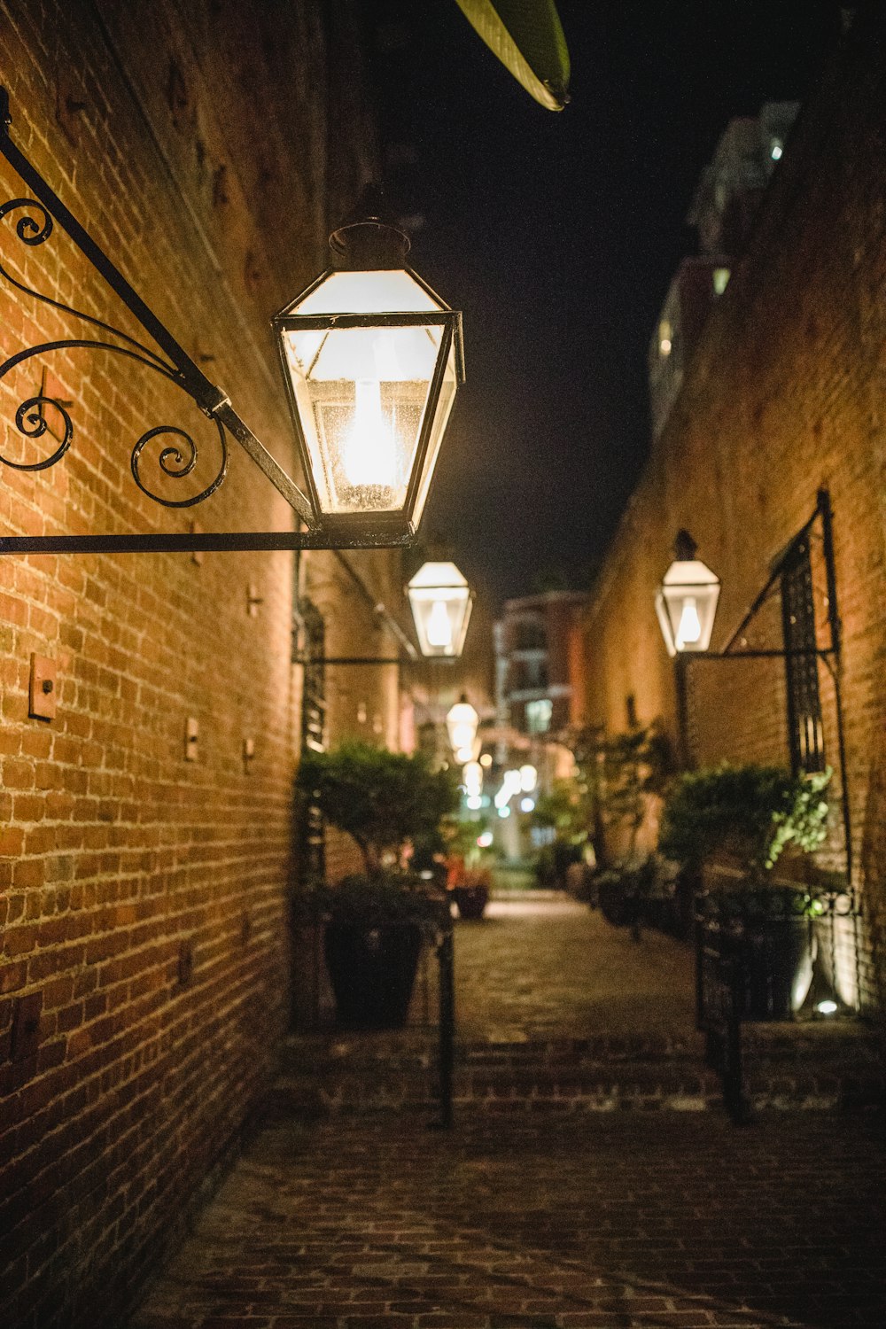 lamp posts near wall