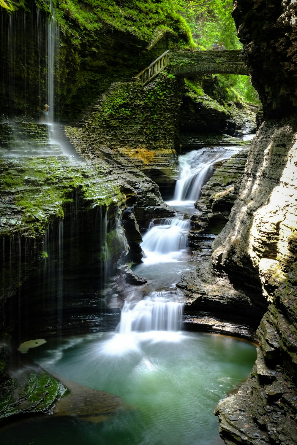 waterfalls near bridge