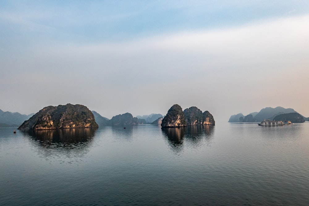 rock formations on body of water