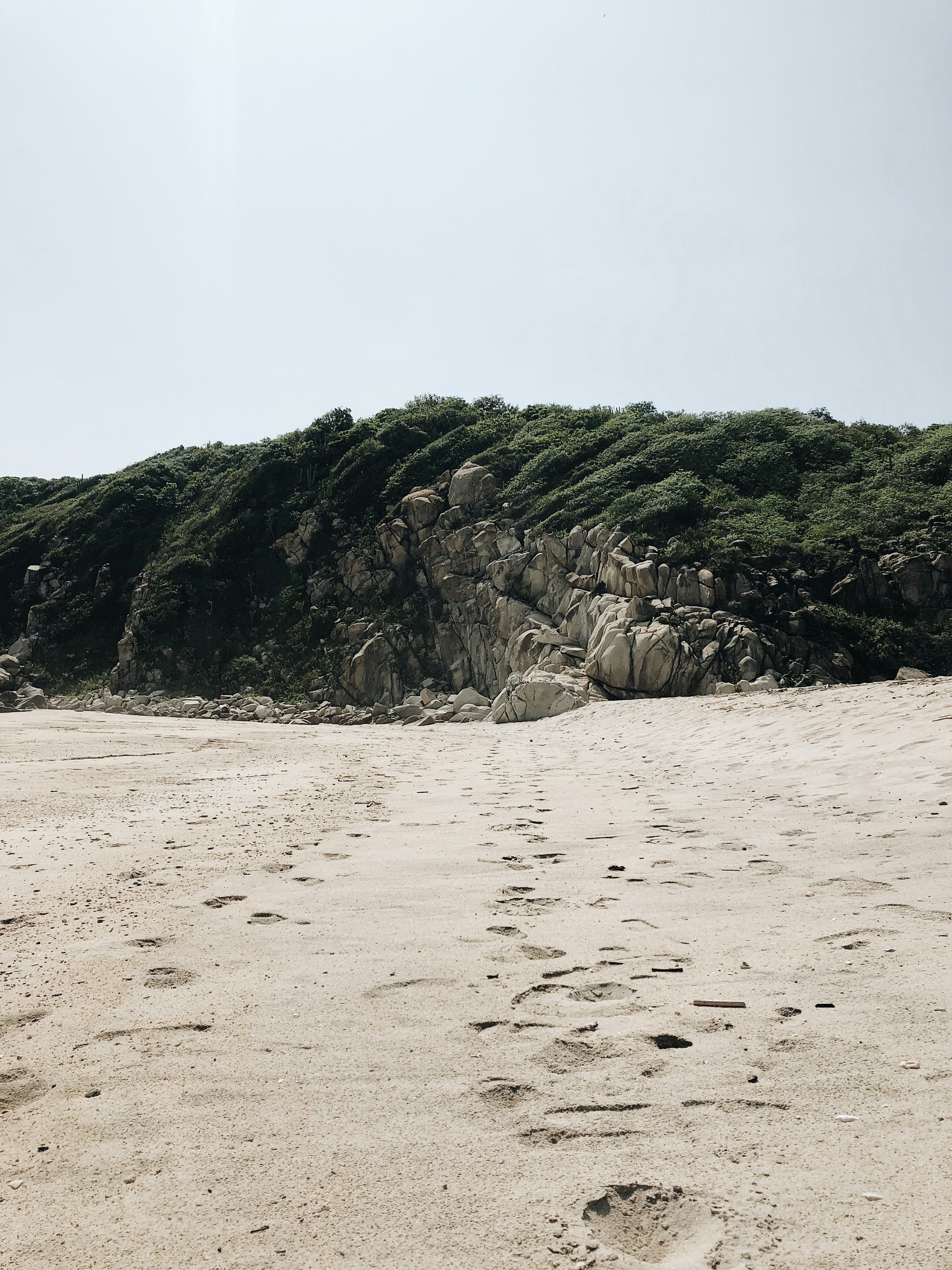white sand under white sky