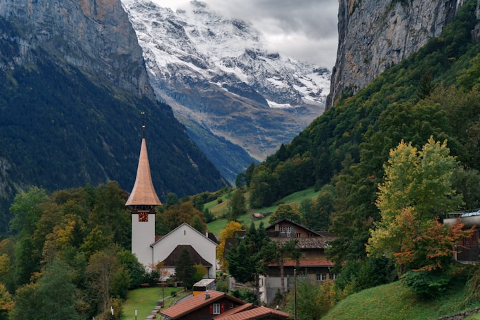 Lauterbrunnen valley houses with forest and mountains Switzerland