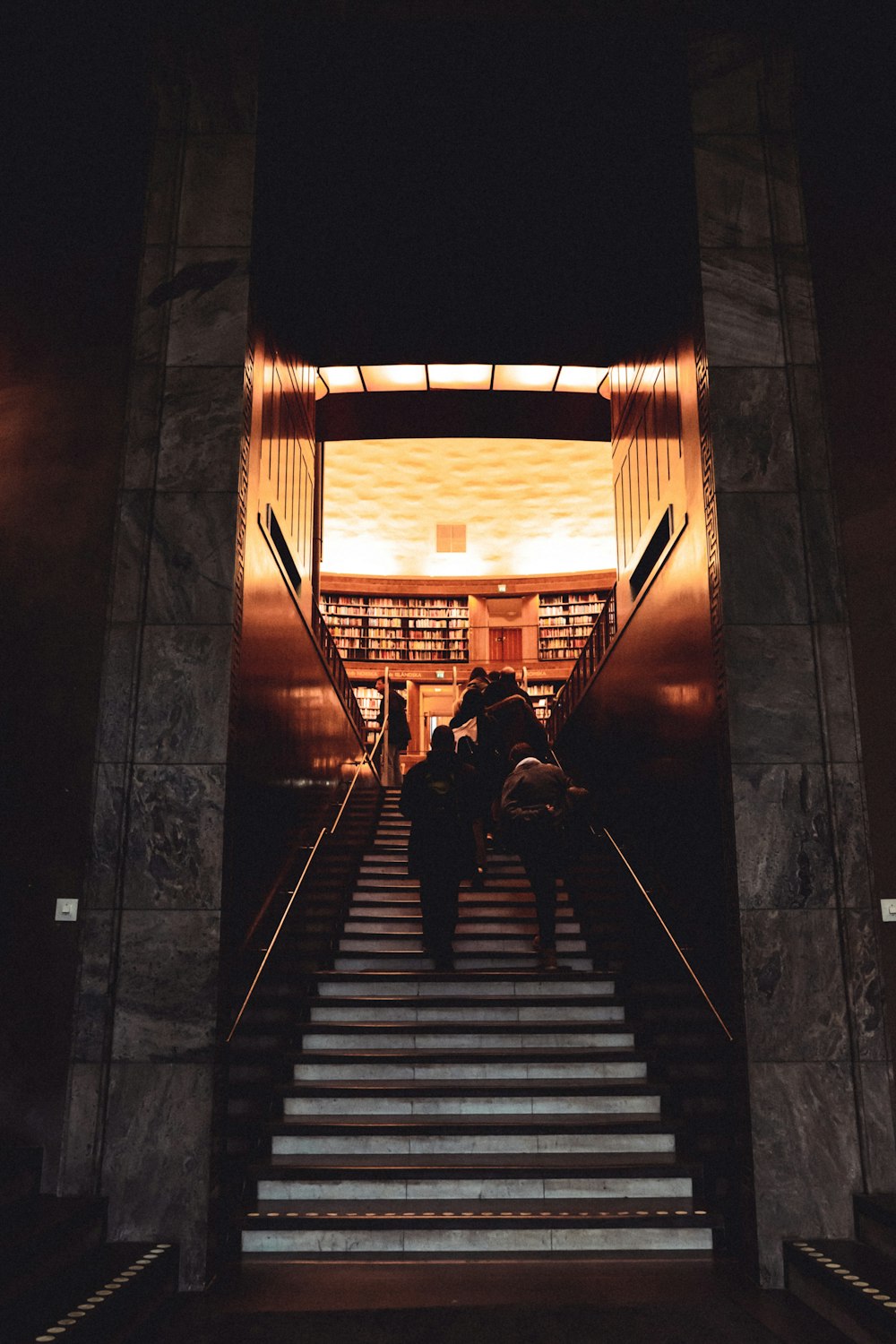 people walking on staircase