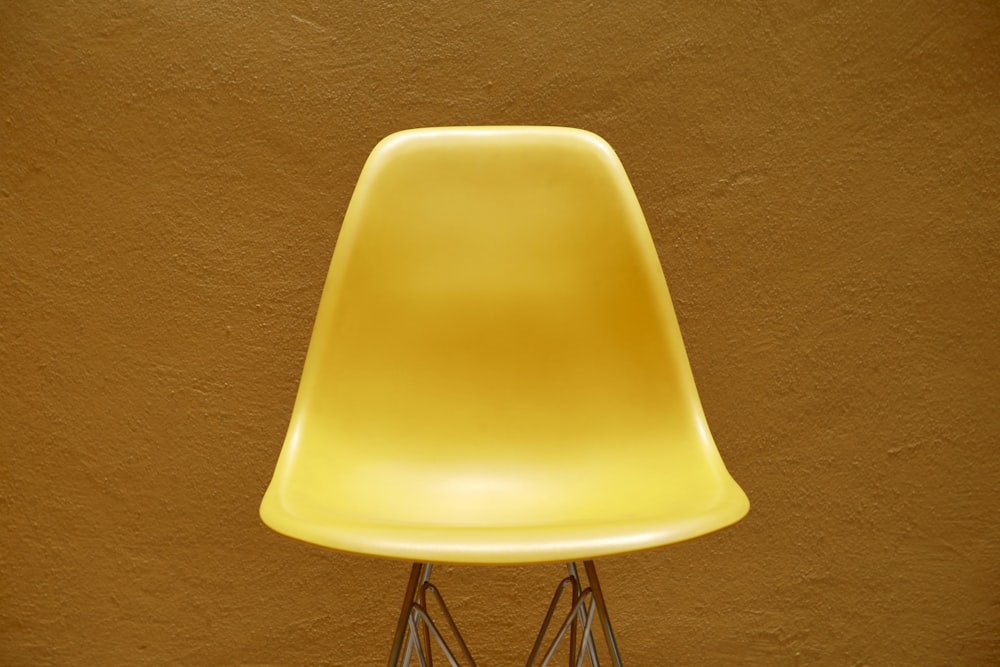 yellow plastic chair