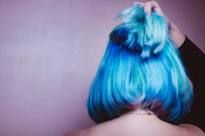person with blue and white hair