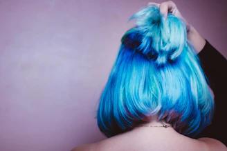 person with blue and white hair