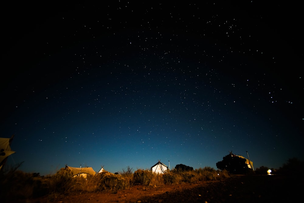 photography of brown tent during nighttime