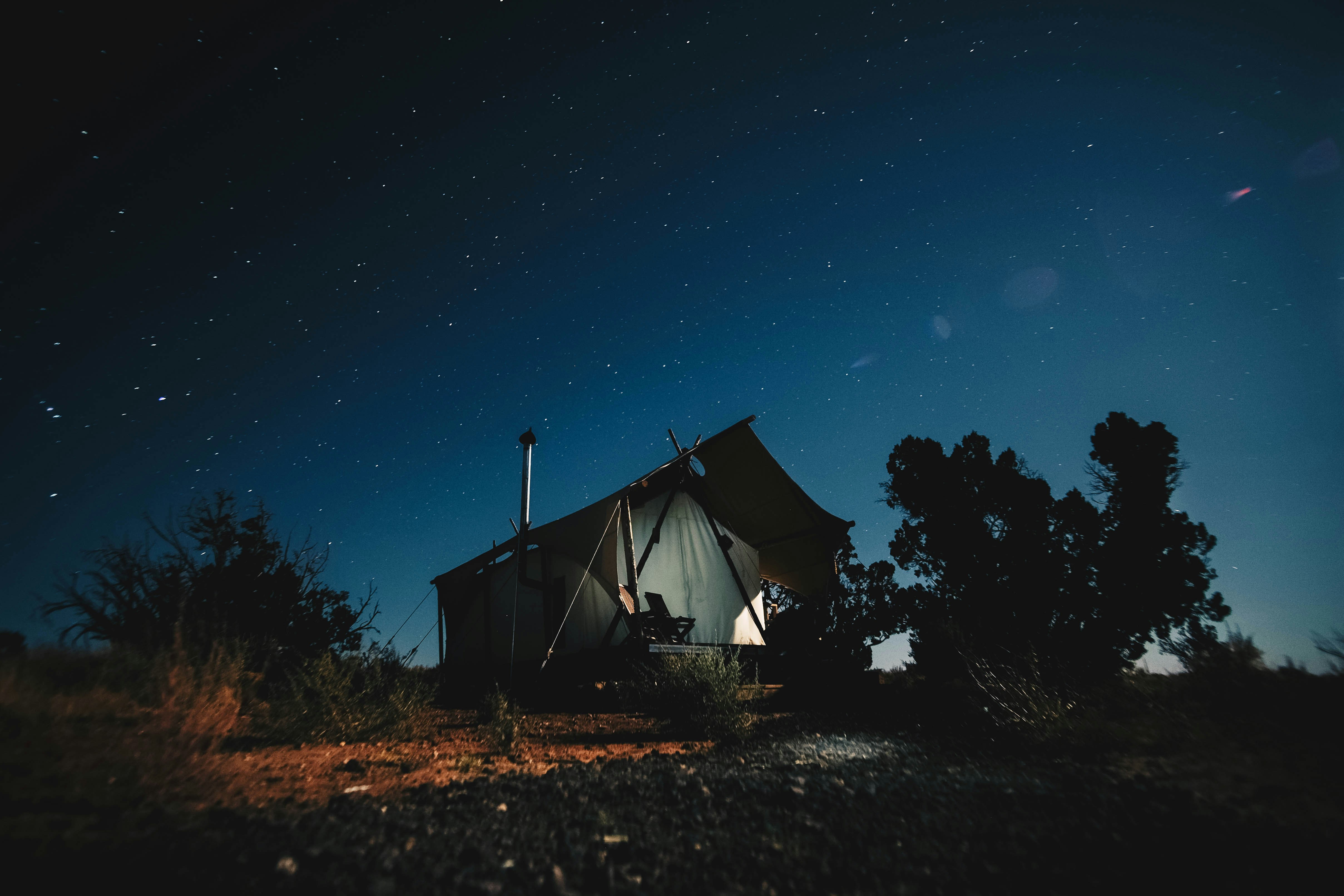 black and gray house under blue sky at nighttime