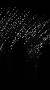 A dynamic frame capturing a live event with dramatic lighting.