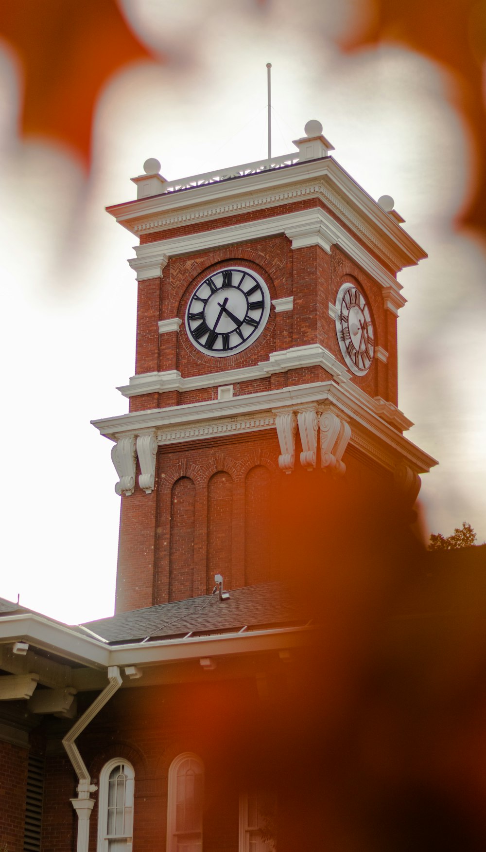 white and brown clock tower