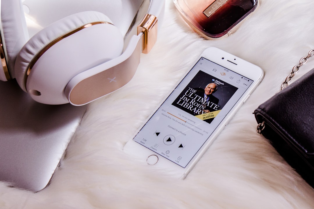 turned-on iPhone, audiobook, Jim Rohn