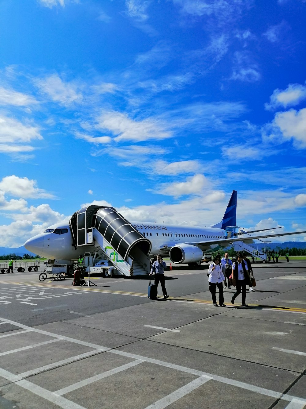 people walking near airplane