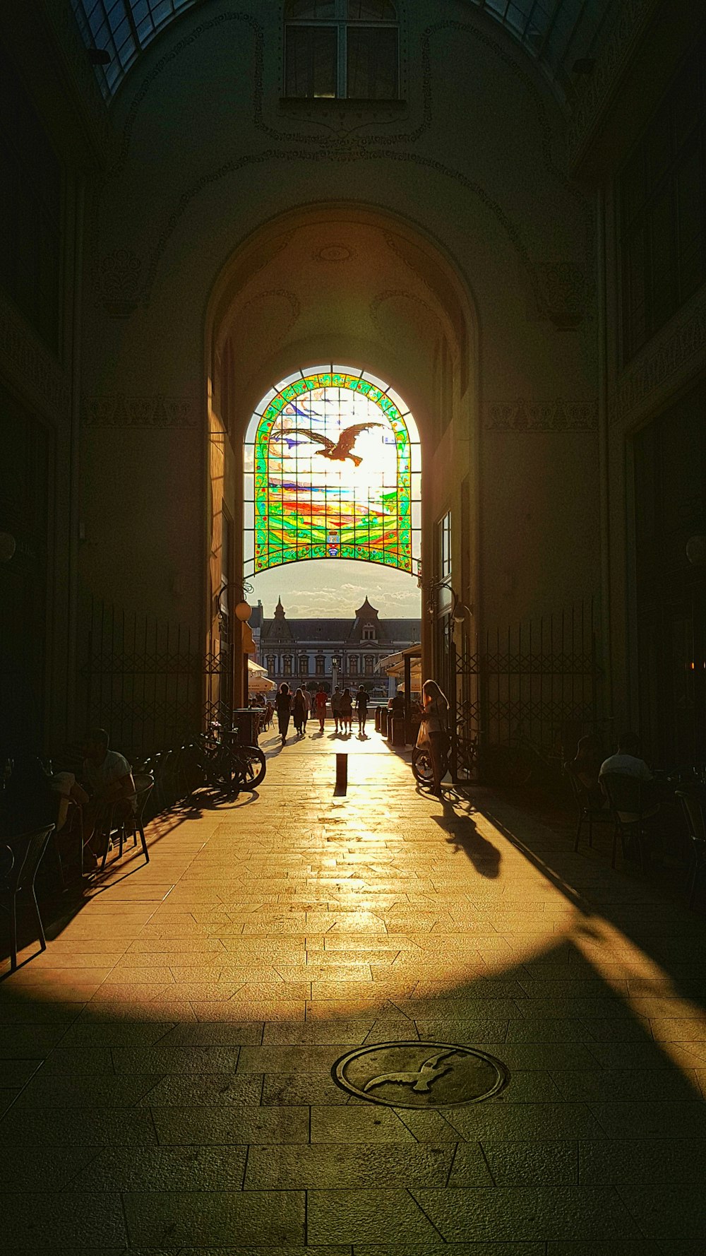 a view of a building with a large stained glass window