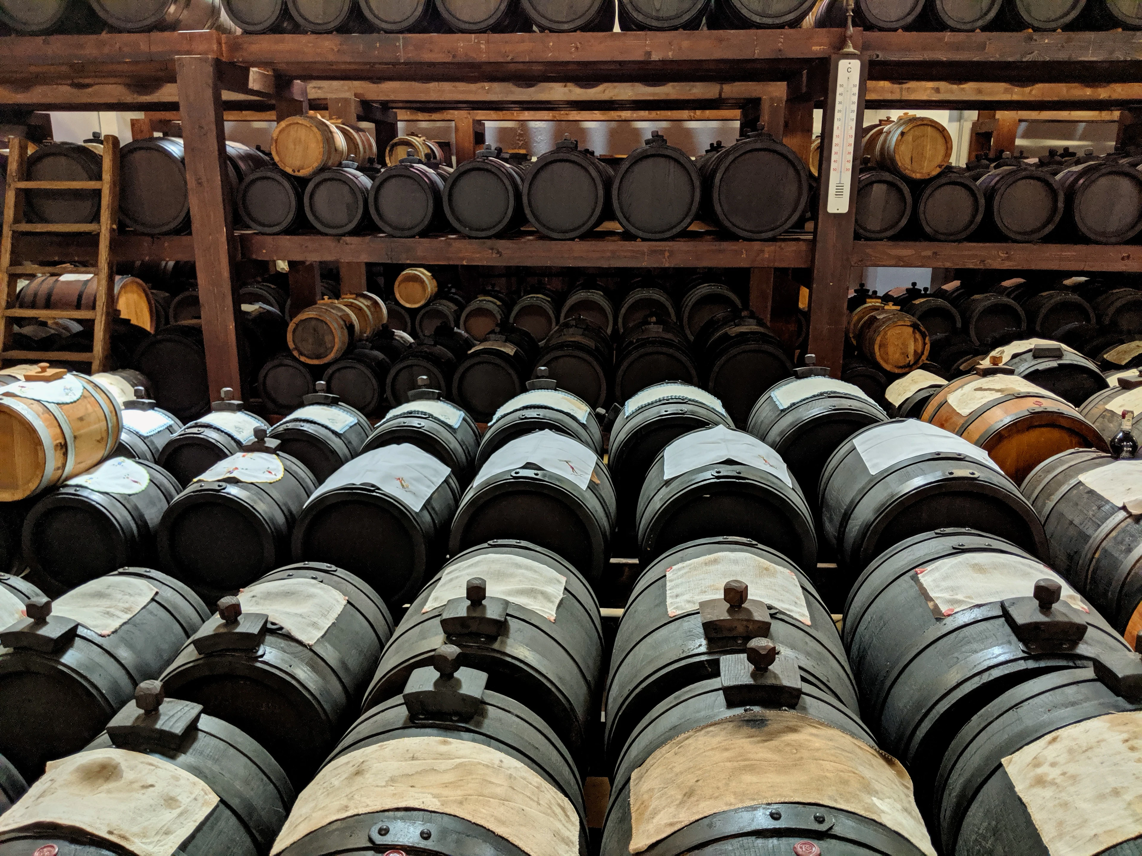 Rows of small wooden barrels where balsamic vinegar is aged, Modena