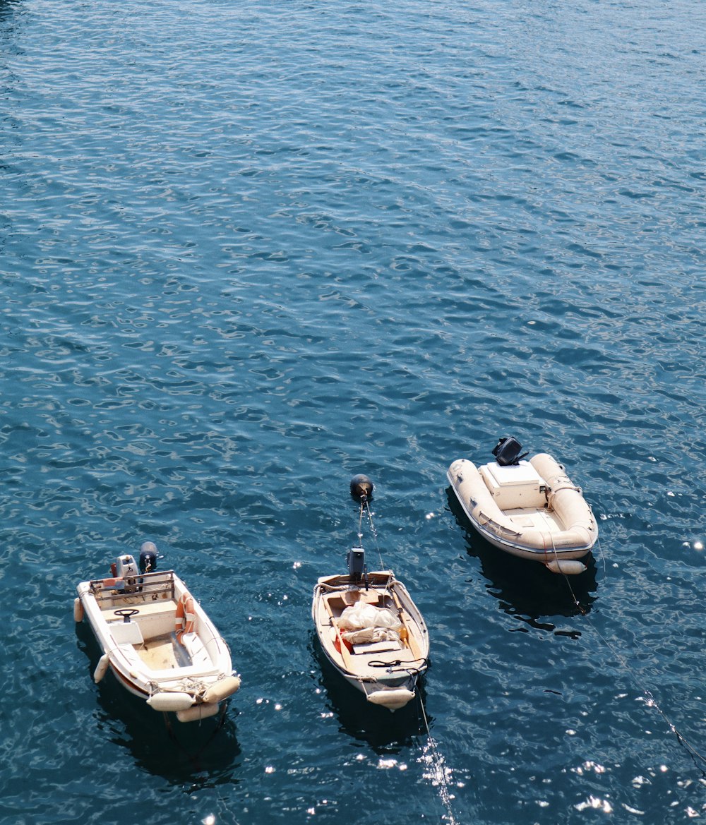 white and black boat with boat