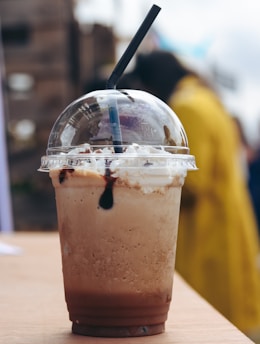 white and brown plastic bottle