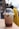 white and brown plastic bottle