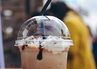 white and brown plastic bottle