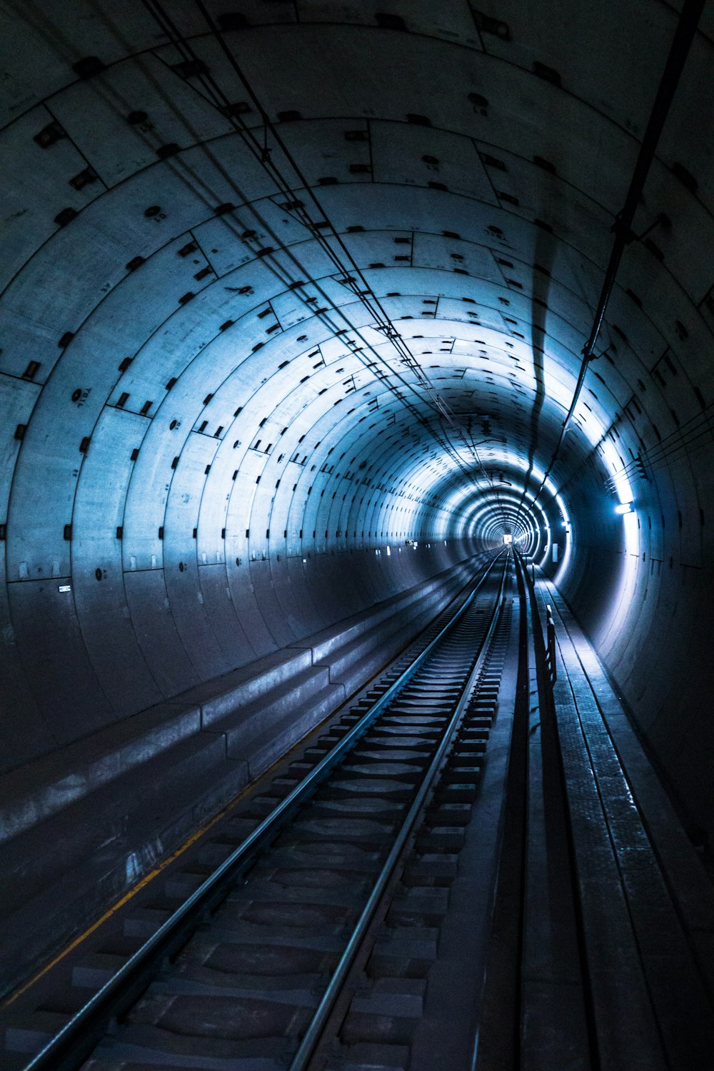 gray concrete train tunnel