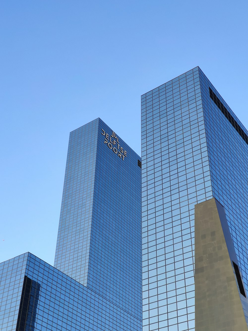 grey curtain buildings during daytime