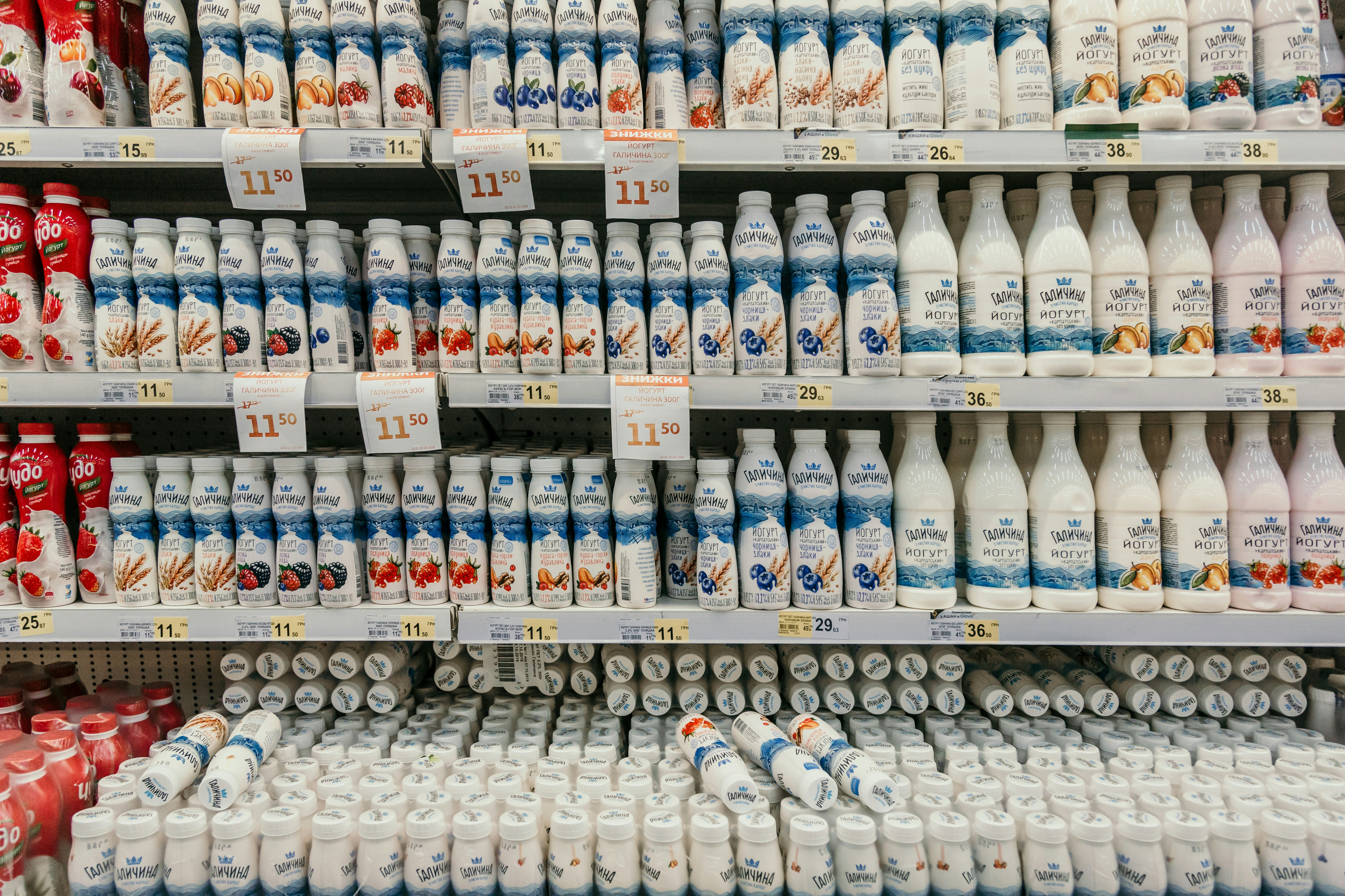 white and blue labeled bottles