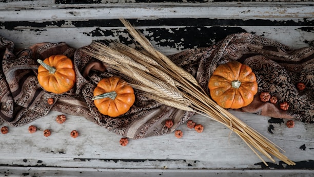 three orange pumpkins