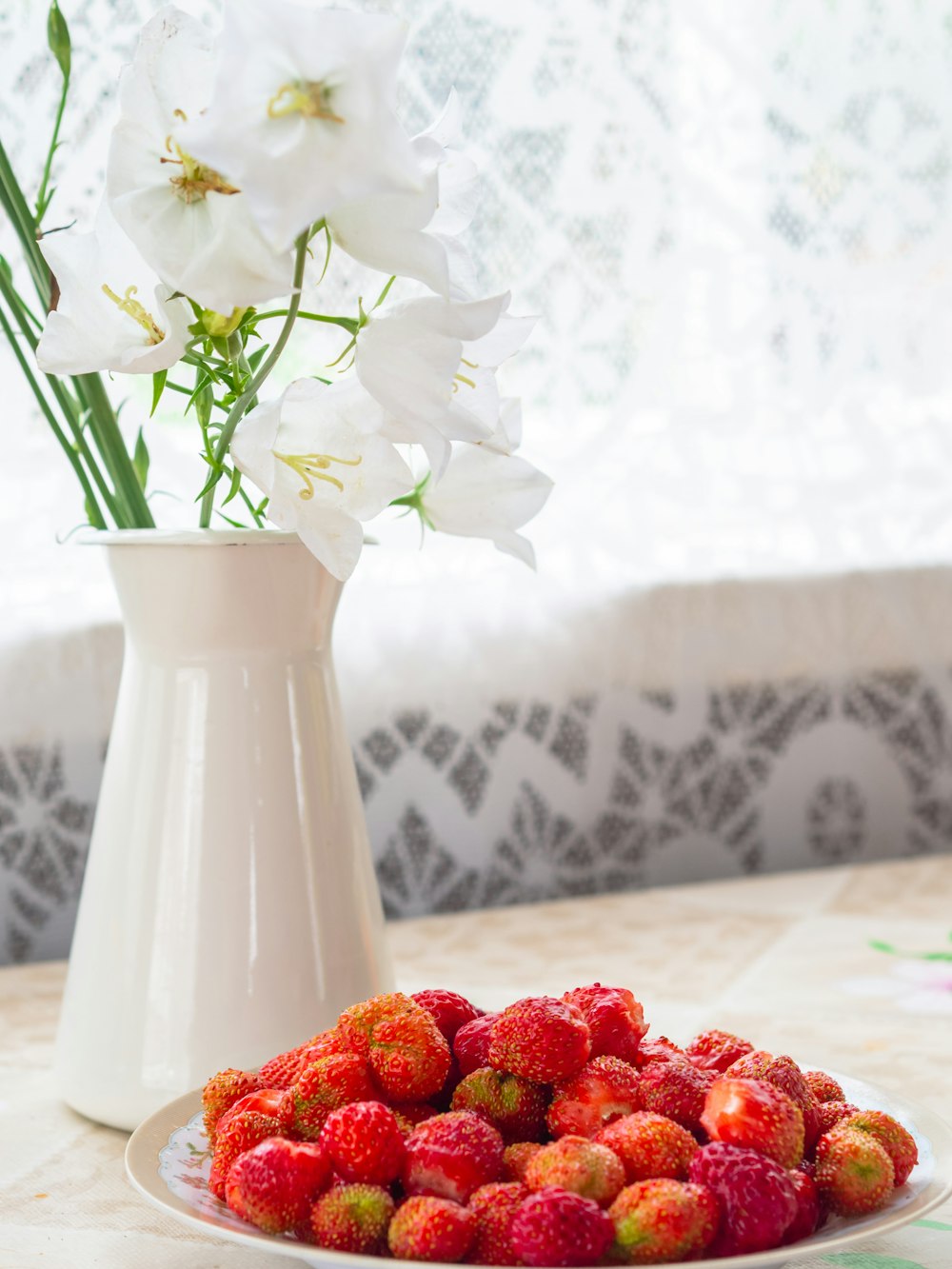 red fruits on plate