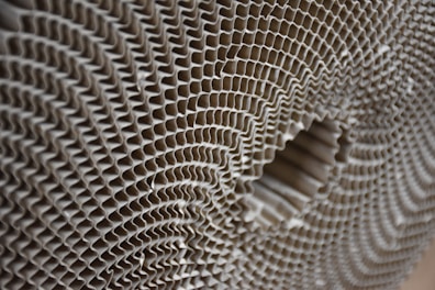 Close-up of reinforced cardboard material showing durability.