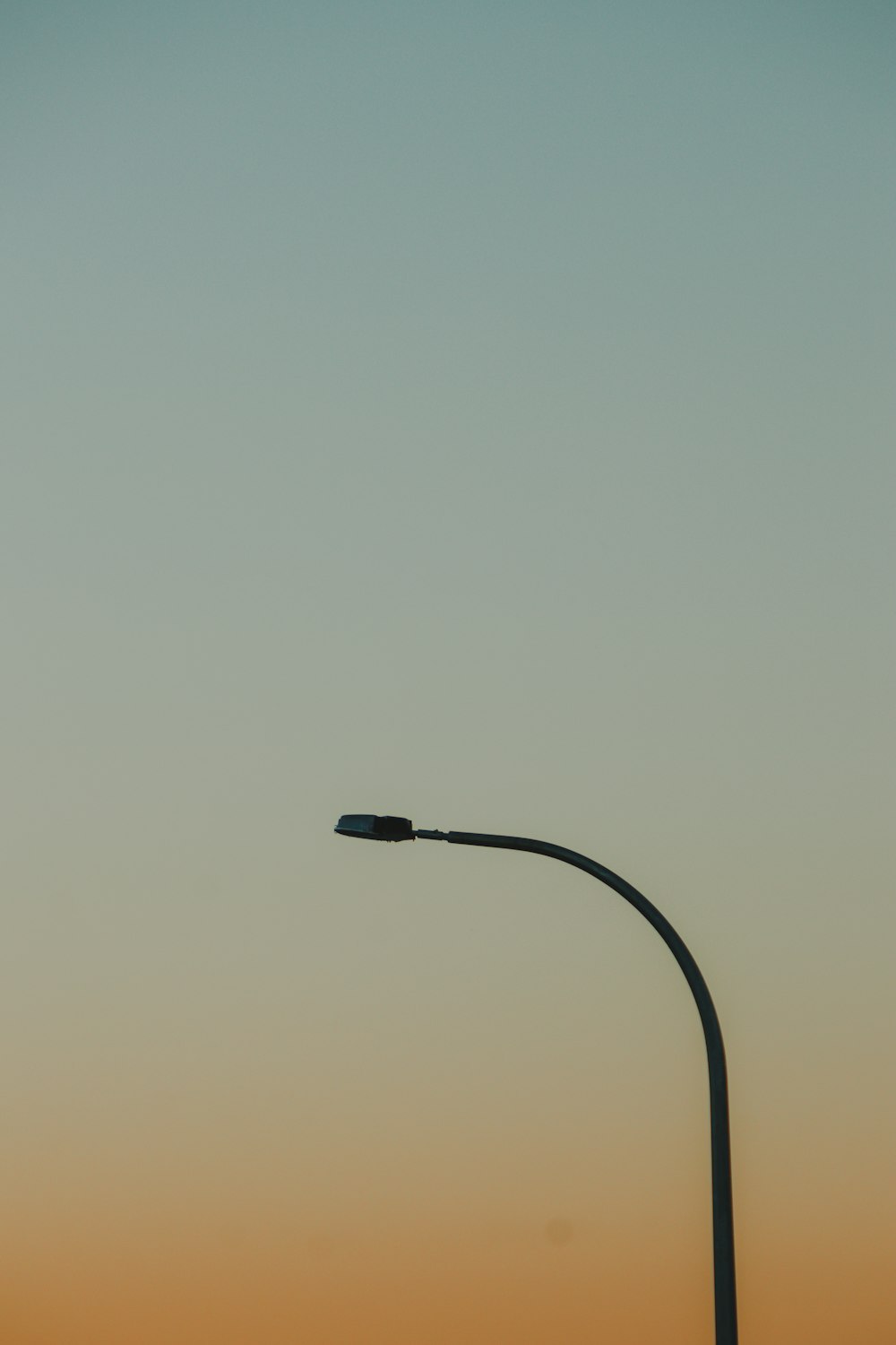black lamppost during day