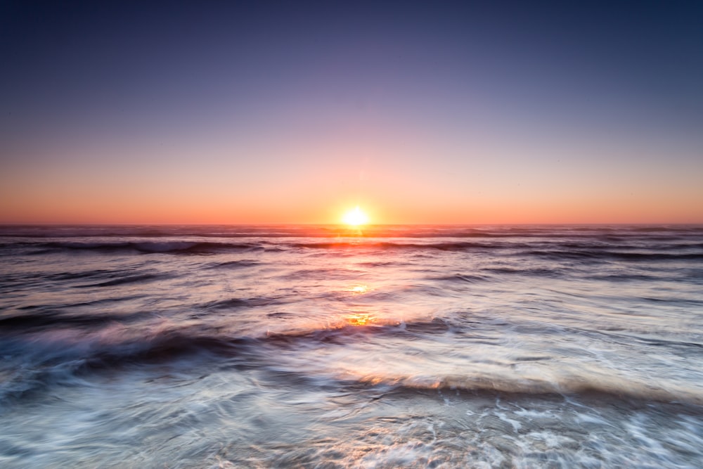 ocean waves at sunrise