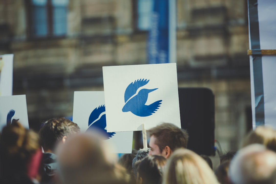 white signboard with blue bird logo