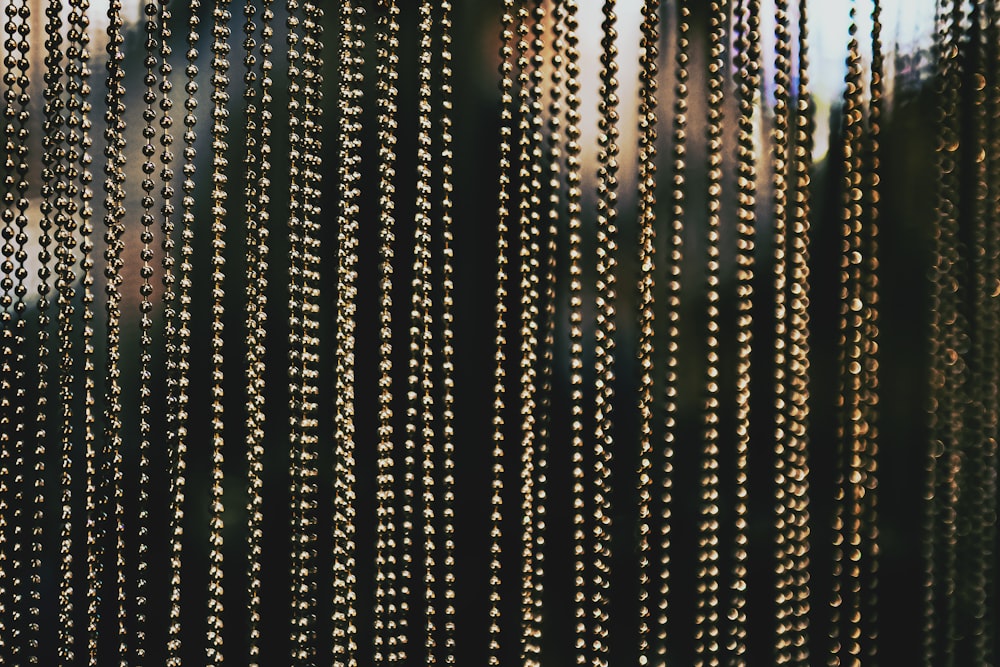 a close up of a curtain made of beads