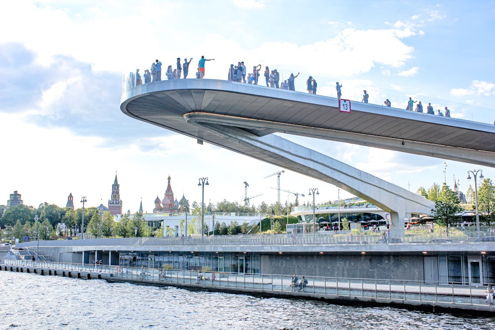 people gathering on bridge