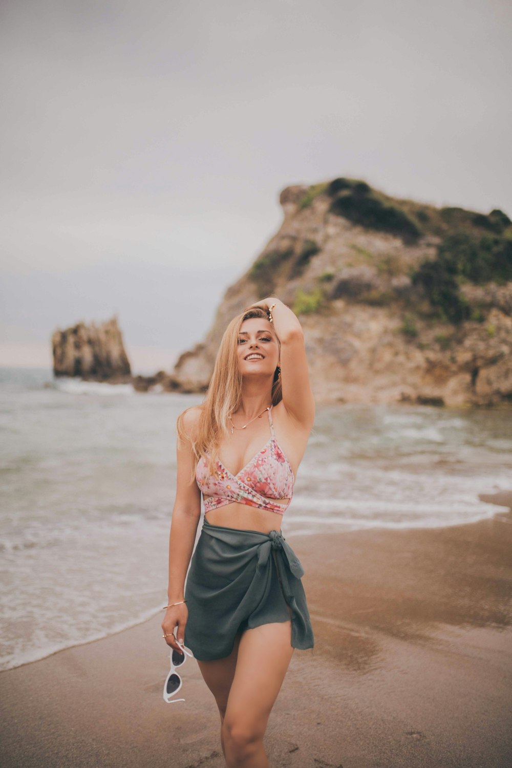 woman standing near ocean