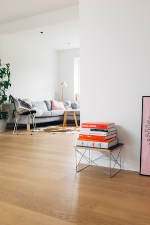 books on brown wooden stool