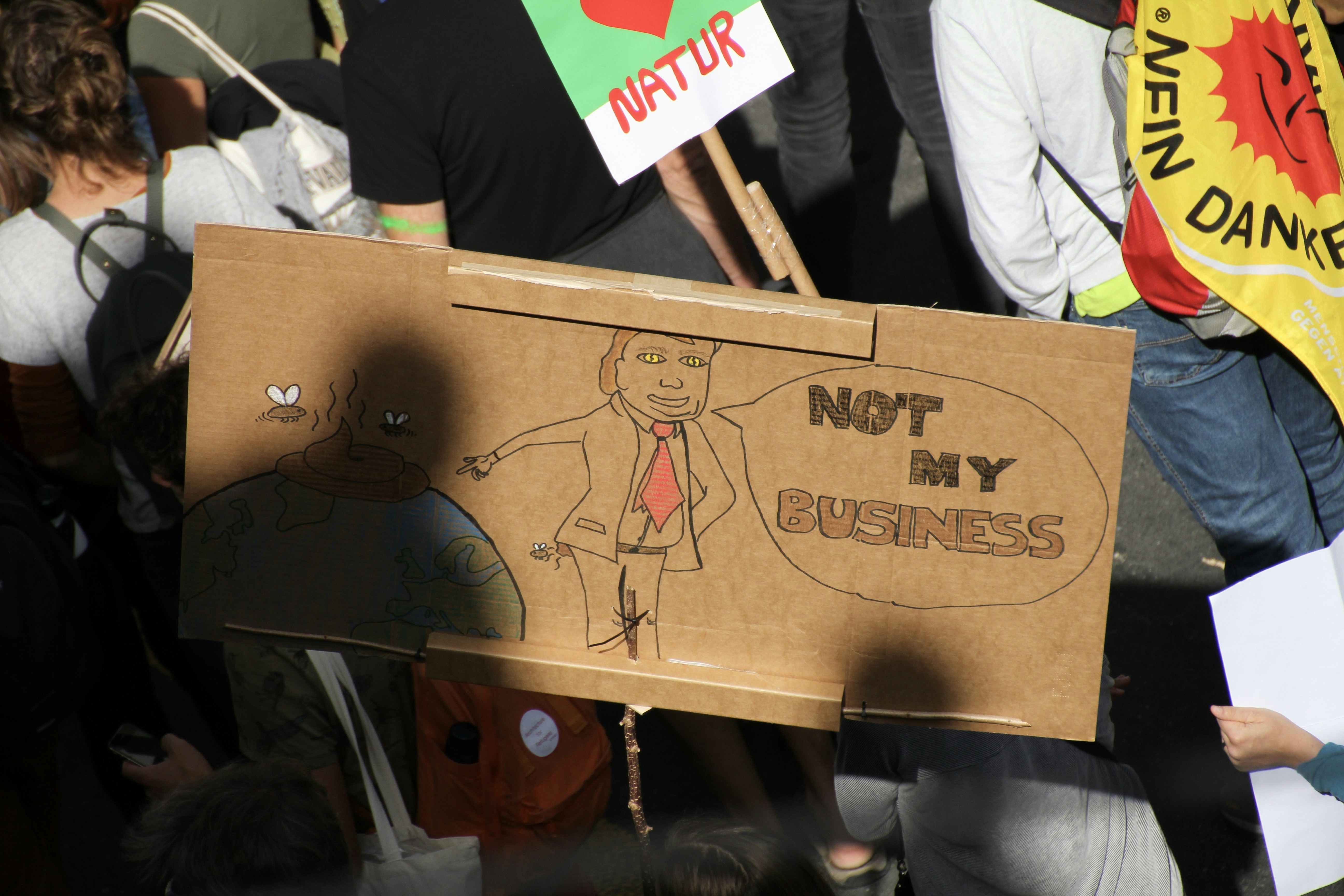 Protest image against circumcision with placards