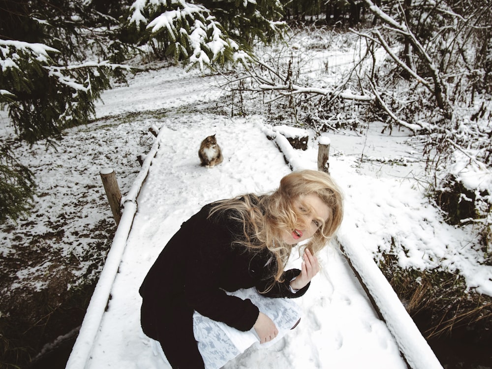 woman standing on snow